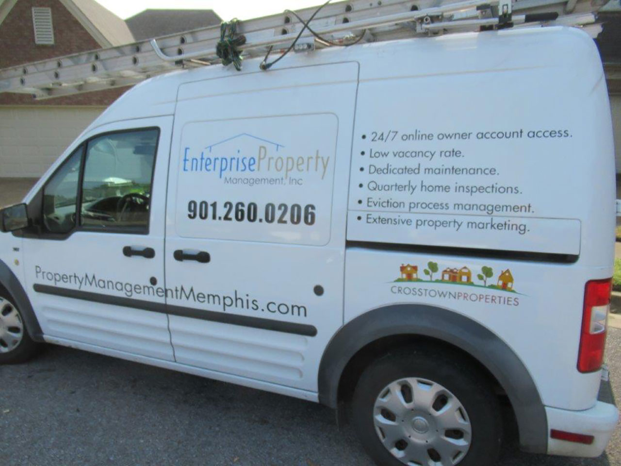 Enterprise Property Management, Inc. Maintenance Van: Side shot of EPM's branded maintenance van.